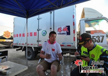 专访连续参加十年环塔拉力赛车手周田